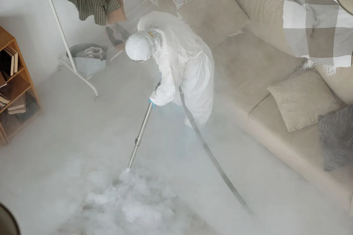 Biohazard cleanup technician in protective equipment, Sun Valley, Los Angeles, CA
